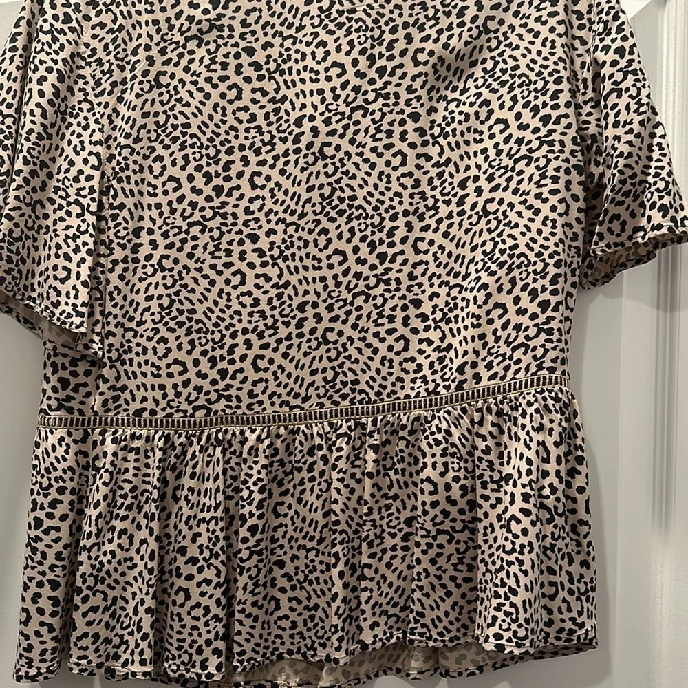 Beautiful Express 100% Rayon animal print top dry cleaned